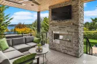 Outdoor covered and heated Entertaining Space off of the Dining and Living Room