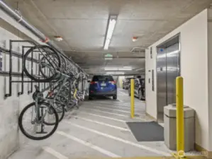 Bicycle storage throughout secured garage