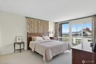 Large primary bedroom with private deck