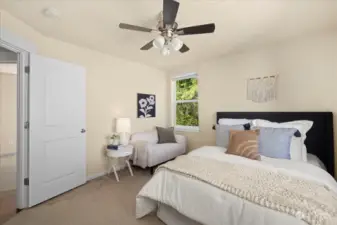 Spacious Guest bedroom with a great space for a sitting area.
