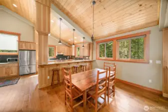 Cozy breakfast nook off kitchen and bar.
