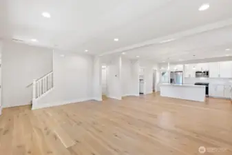 Head up the stairs to the private spaces of this lovely home.