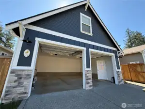 The large double garage is perfect for projects and car storage.  There are two garage door openers for ease!