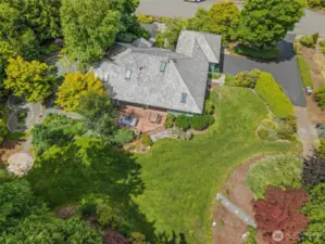 View of the backyard, zen garden, back deck and garden space.  Create the backyard of your dreams!