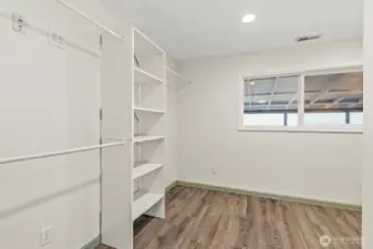 primary walk in closet with laundry hook-ups