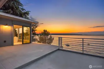 The upper deck highlighted here: sizable and open to the elements. It is rare along the local waterfront to enjoy such extensive decks (found on each level). Truly the ideal place for future plantings like tomatoes & vegetables, herbs, potted trees, and lounging chairs.