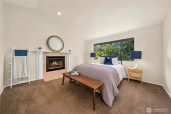 Ahhhh!  The gas fireplace in the primary suite welcomes you to your private own sanctuary.