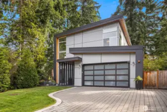 Low maintenance living in this future forward designed hom