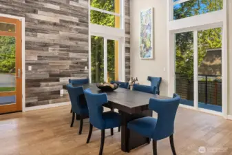 Large Dining area with soaring reclaimed wood backdrop