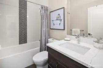 A third bath on the upper floor including for roof top guests