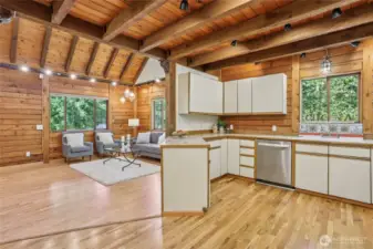 Large kitchen with ample counters for meal prep plus additional space for an eat-in nook.