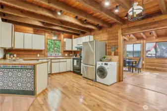 Generous open doorway leads to the formal dining area, creating effortless flow for entertaining.