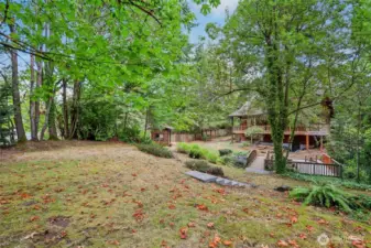 Expansive flat yard perfect for gardening or outdoor sports.