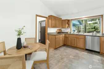 Flexibiity is paramount in this layout - a pocket door is in the wall seen here if you prefer to close off the front door when guests are arriving.