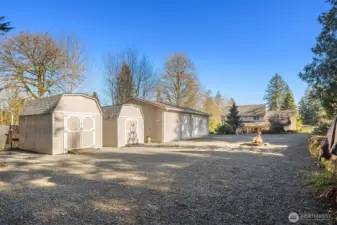 Detached 4 Car shop with car lift! Lots of shed storage. Bring all your toys!
