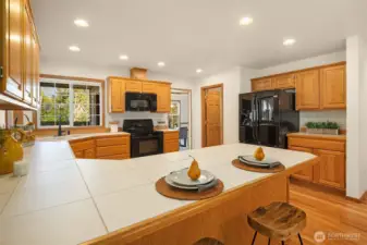 Large country kitchen with walk-in pantry.