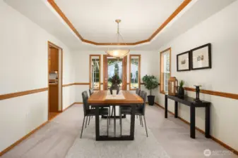 Formal Dining Room with French doors leading to the outdoor entertaining patio.