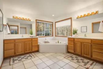 Primary 5-Piece Bath with separate vanities and jetted tub.