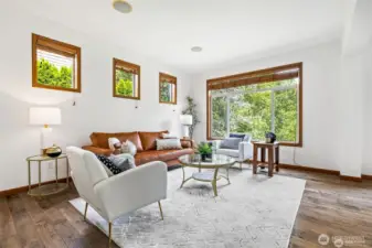 Bright, cozy living area filled with natural light.