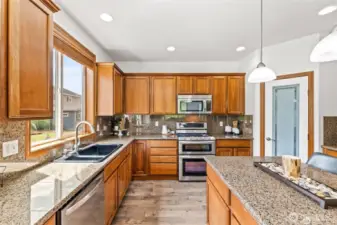 Functional layout with durable finishes and a spacious pantry.