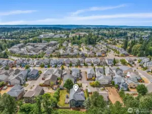 Aerial views showcase the large lot and quiet neighborhood.