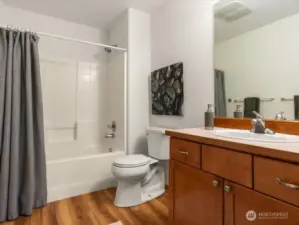 Upstairs secondary bathroom with linen closet, thoughtfully positioned across from bonus/ 5th bedroom