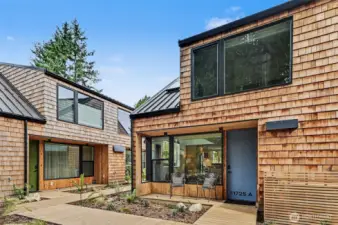 Back patio facing the community space, facilitating connectedness