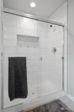 Custom tile in the primary shower.