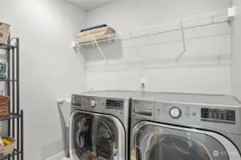 Convenient upstairs laundry.