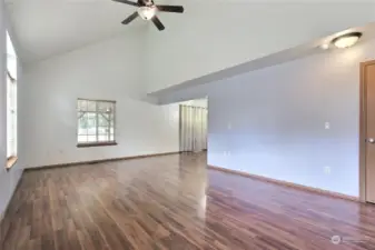 Living Area to Dining & Sliding Door to Back