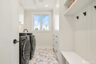 Laundry and mudroom located on the main level when you enter from the garage.