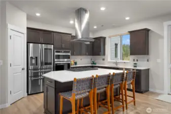 From the stainless steel appliances to the quartz counter tops, this kitchen is just as beautiful as it is functional!
