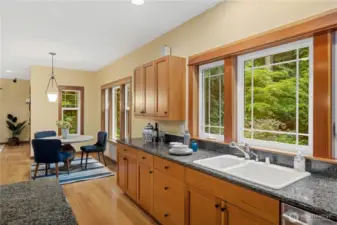 This view shows the eat-in area next to the kitchen.