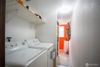 Laundry area downstairs, coupled with 3/4 bath
