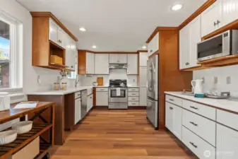 Spacious kitchen with stainless appliances and plenty of counter and storage space.