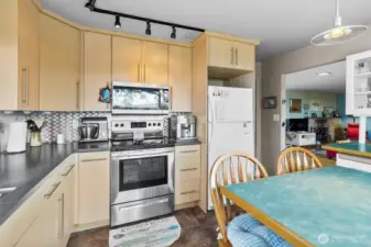 Functional kitchen design with stainless steel appliances, generous counter space, and storage options.