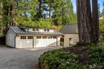 Expansive auto-court with 3-car garage.