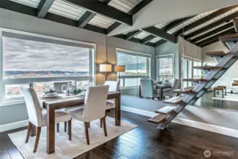 Large mirrors wrap the view around the dining area.