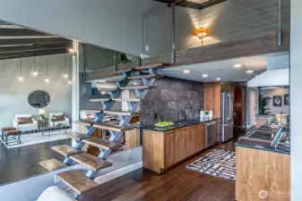 Spacious kitchen is at the center of living here.