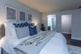 Primary suite fits a king size bed.  Private bathroom & walk in closet.