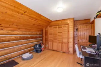second bedroom upstairs in the log home