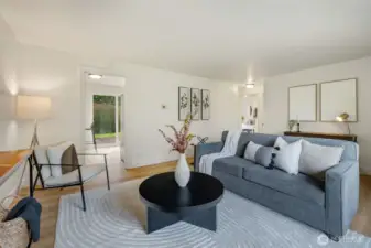 A nice flow into the kitchen or to the original home's 2 BD/1BA