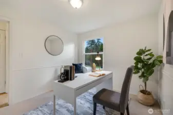 The third bedroom can fit a standard sized bed but also makes a great office.