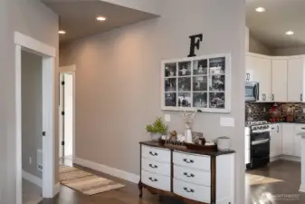 Entryway to hallway with stylish decor and warm welcoming design