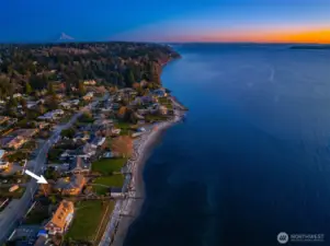 Welcome to the soothing serenity of Puget Sound living with this iconic beach property in the very heart of Normandy Park.