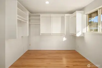 Generously sized walk-in closet