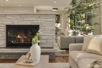 Cozy up for the natural gas fireplace. Notice the mirrored walls which act as a water trompe l'oeil.