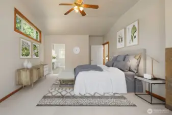 Large Primary Bedroom with level out access to deck & lake. Cozy gas fireplace. Fresh carpets & paint through-out.