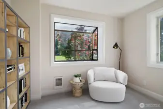 Small reading room or small bedroom on main with garden window and views of the lake off kitchen area - Virtually staged to show possibilities.