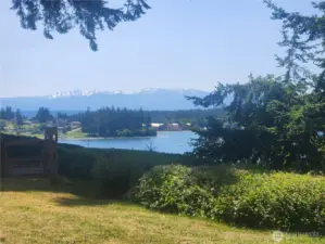 Views looking towards Freeland park over Holmes Harbor with the Olympic mountains